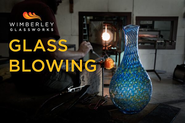 A glass blowing class is being performed.