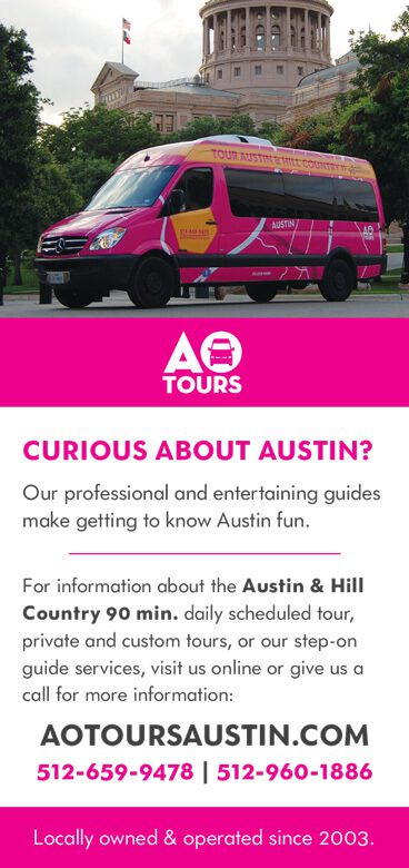 A pink bus with the words curious about austin ?